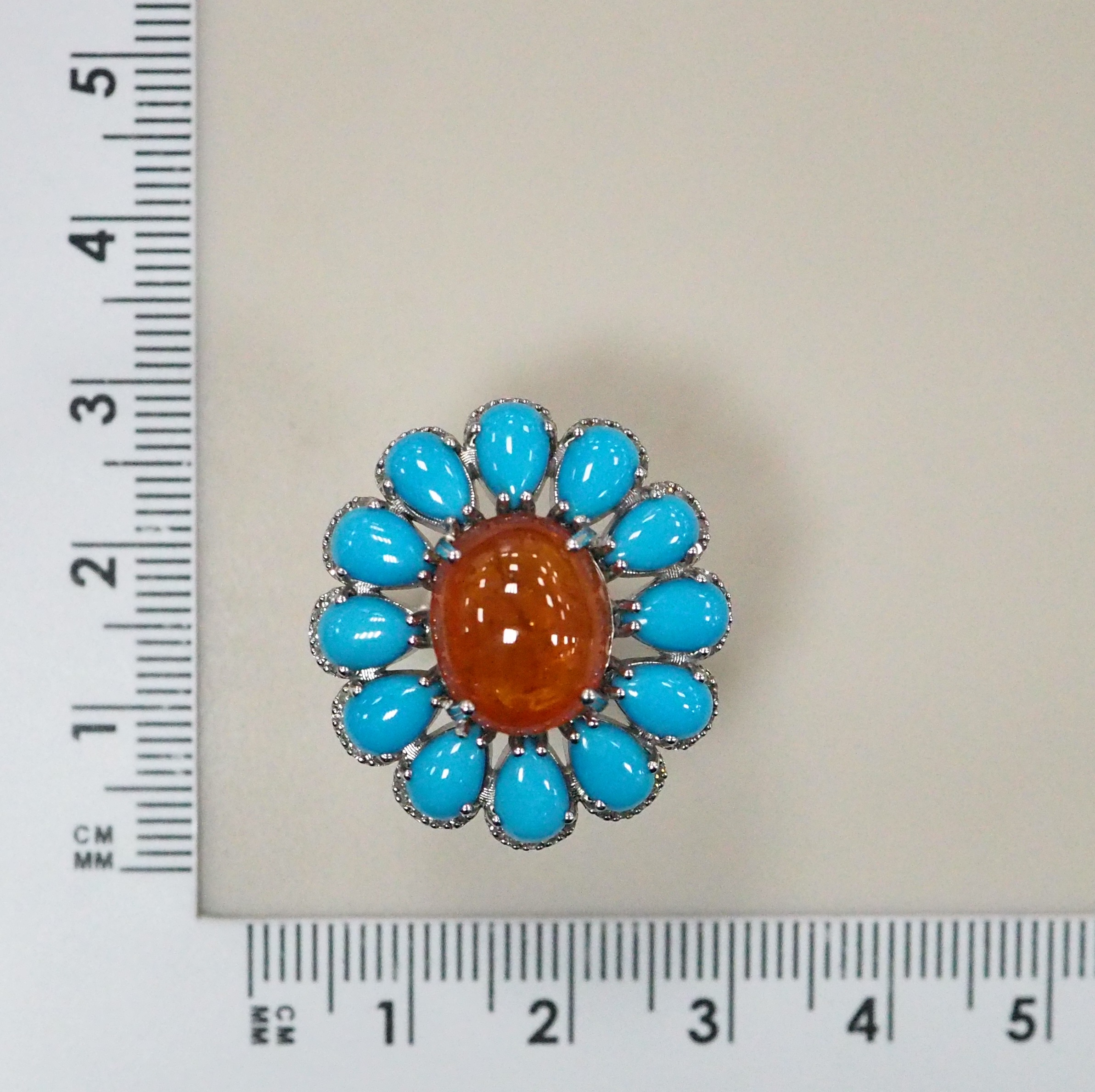 Серебряное кольцо со спессартином и бирюзой
